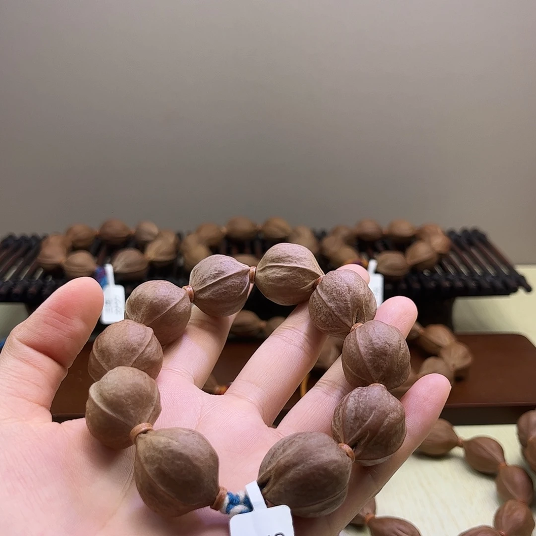 赵***生吊坠橄榄核梅林铁核文玩手串