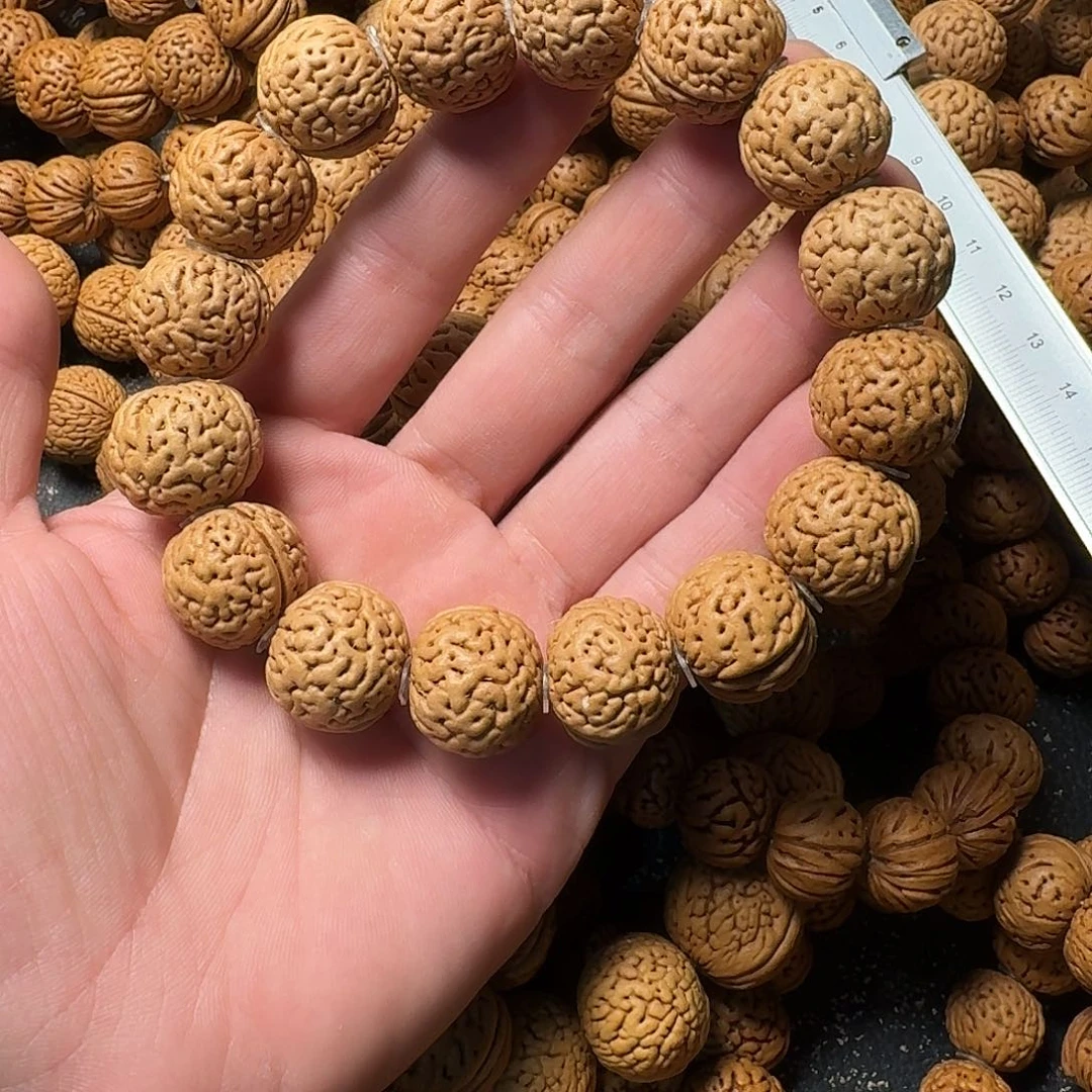 北***。吊坠桃核野生手串