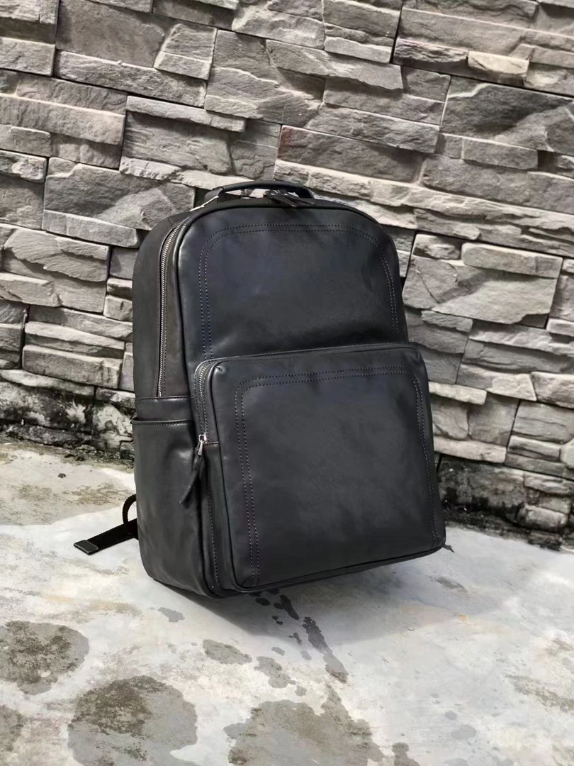 OLOYEI背包电脑包牛皮休闲百搭尺寸31高44宽15  6007双肩