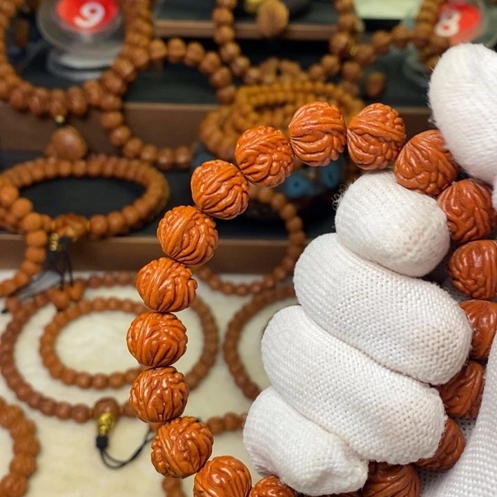 汗***店桃核手串秦岭龙纹桃核