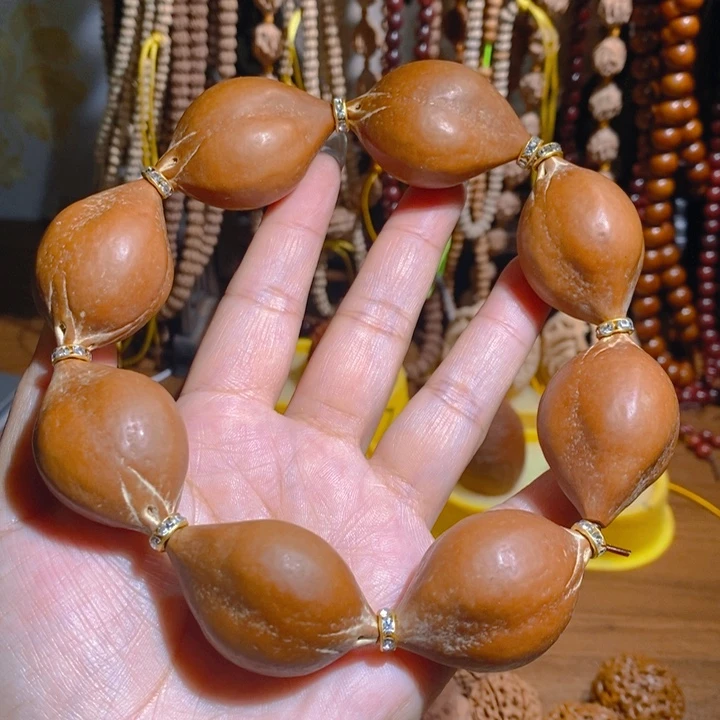 野生巴西大橄榄核手持