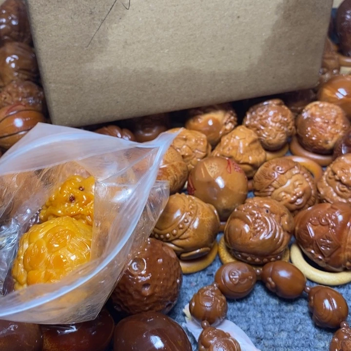 橄榄核吊坠纯手工手持
