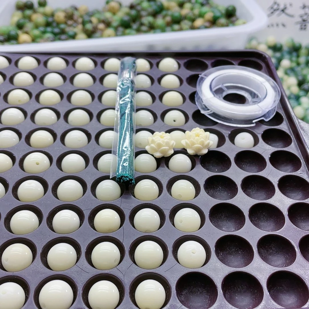 菩提根/象牙果手串会*特价11.5白玉无售后