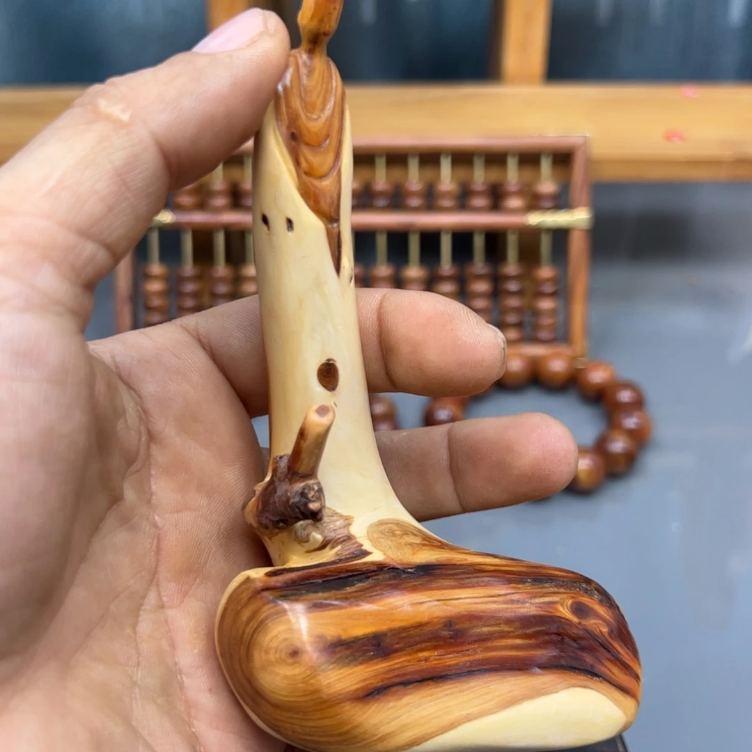 一***）木崖柏木摆件手把件