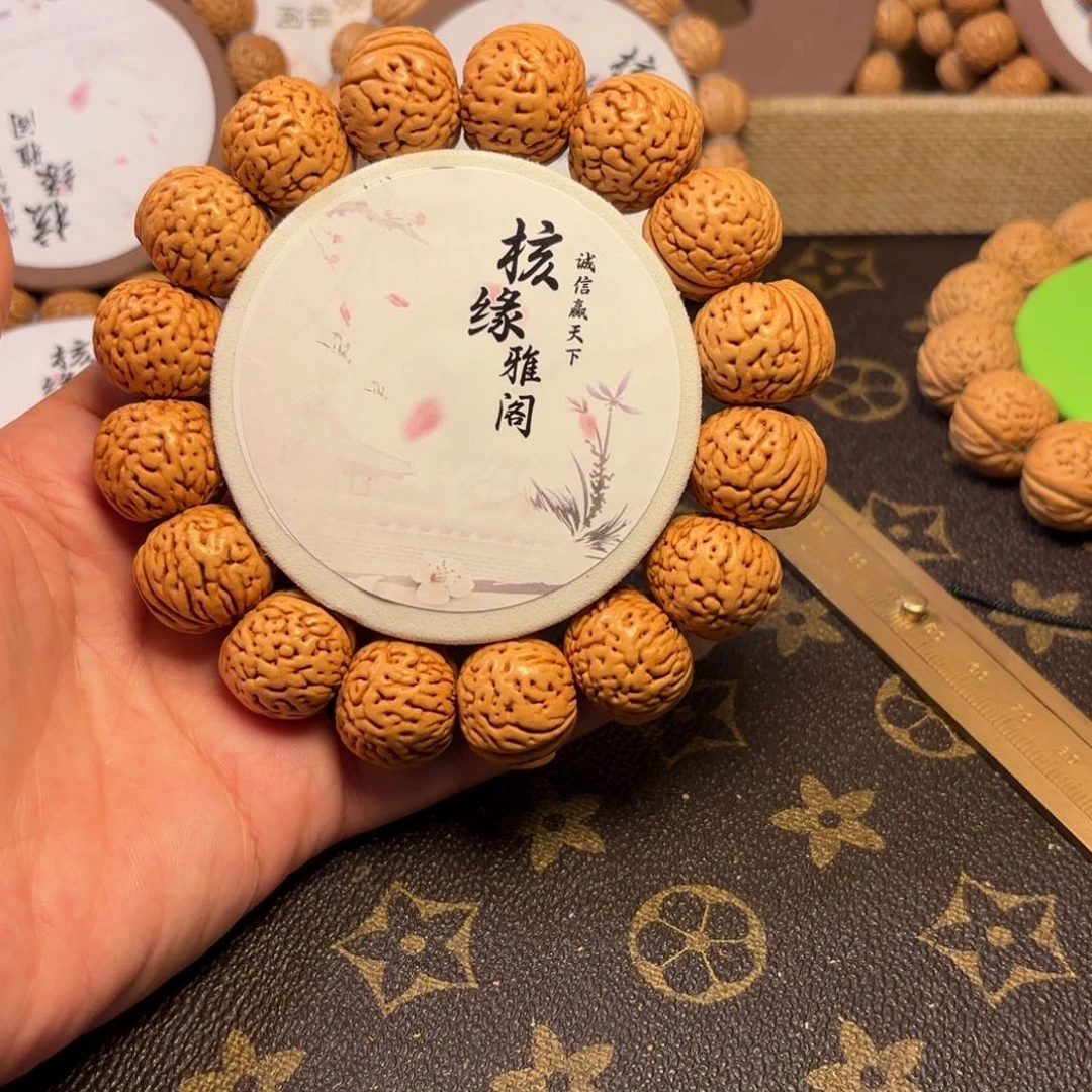 樂***！桃核手串苹果园桃核手串