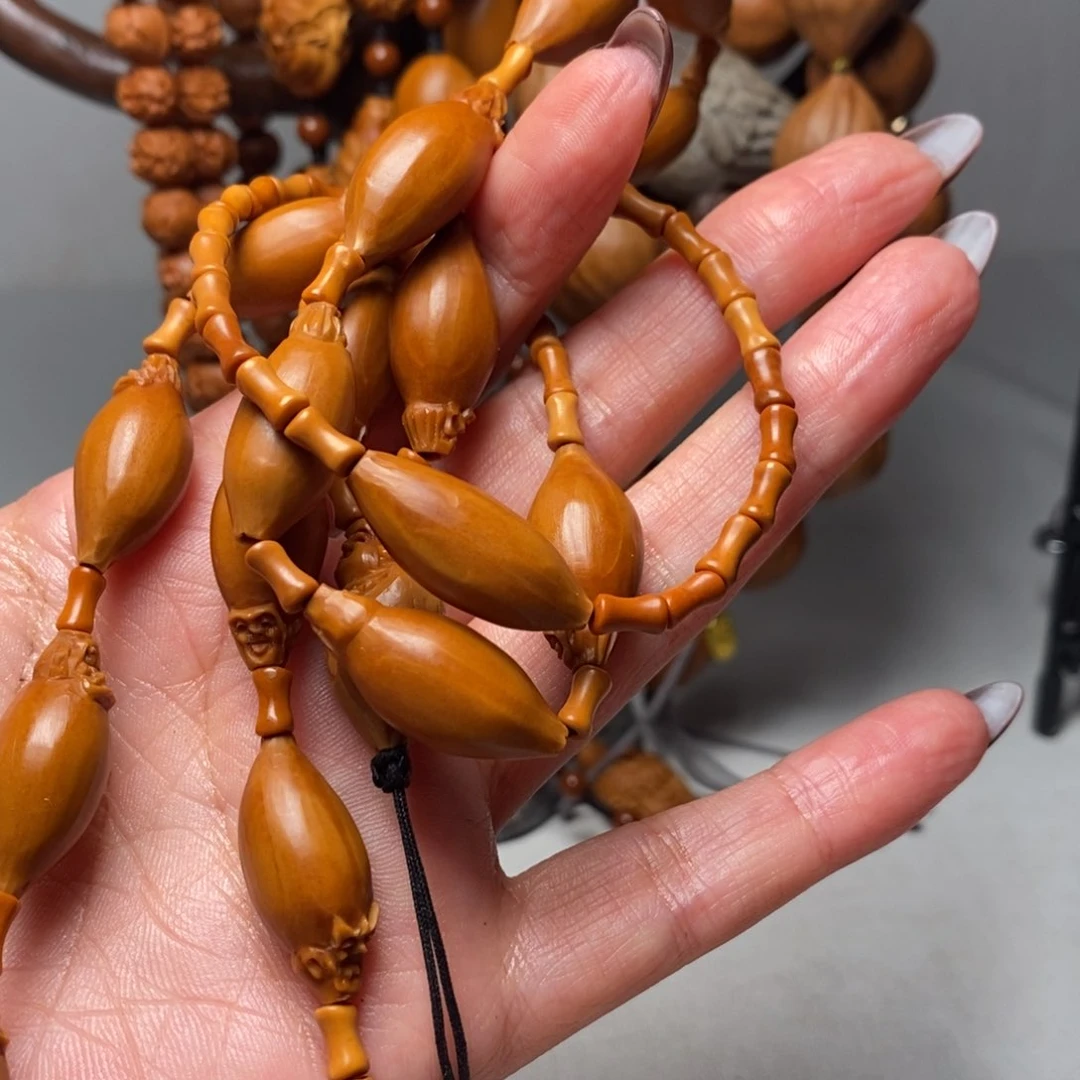 橄榄核手串/手链起****）大脑门罗汉脖挂