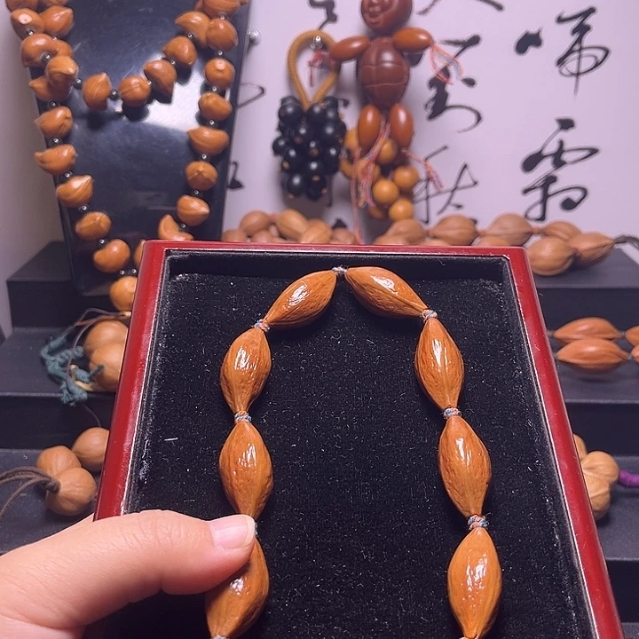 橄榄核手串大长腿手持14.34