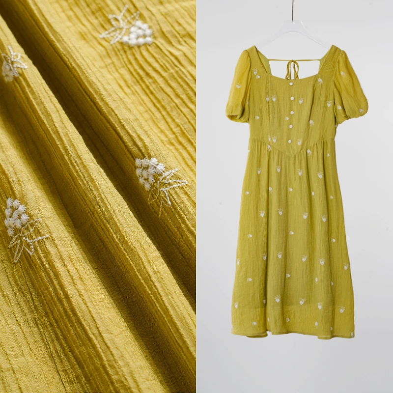 2025新款方领刺绣清新泡泡袖蝴蝶结绑带收腰压褶A字连衣裙74U0179