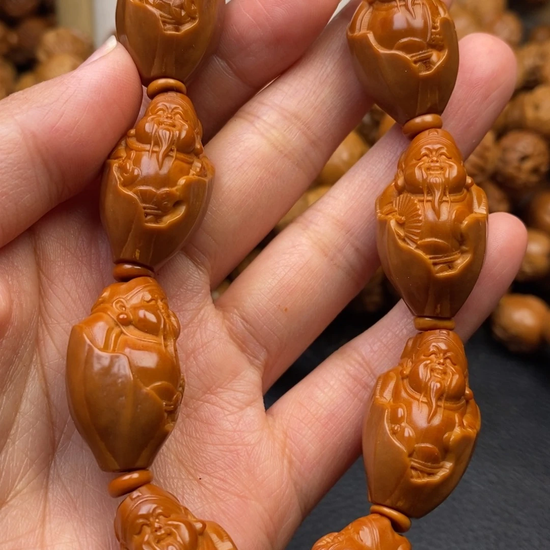 橄榄核吊坠包衣财神