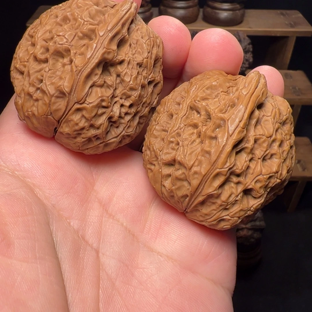文玩核桃把件紫衣将军膀42mm