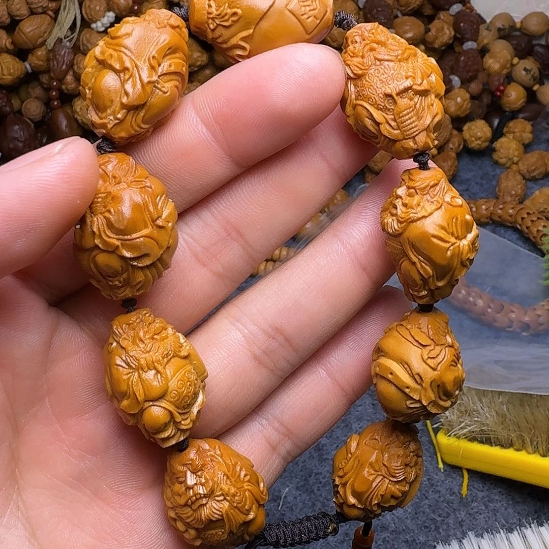 橄榄核手串退还给