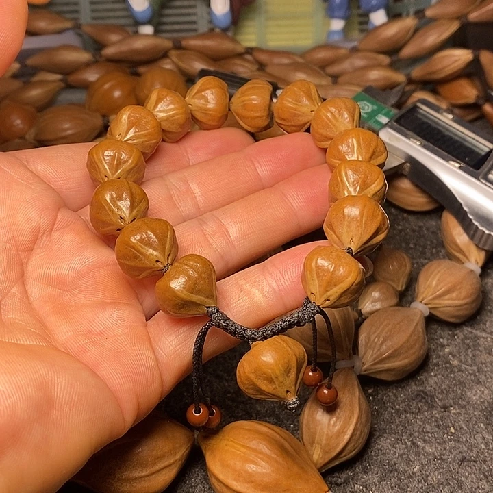 手串橄榄核1.6四花9