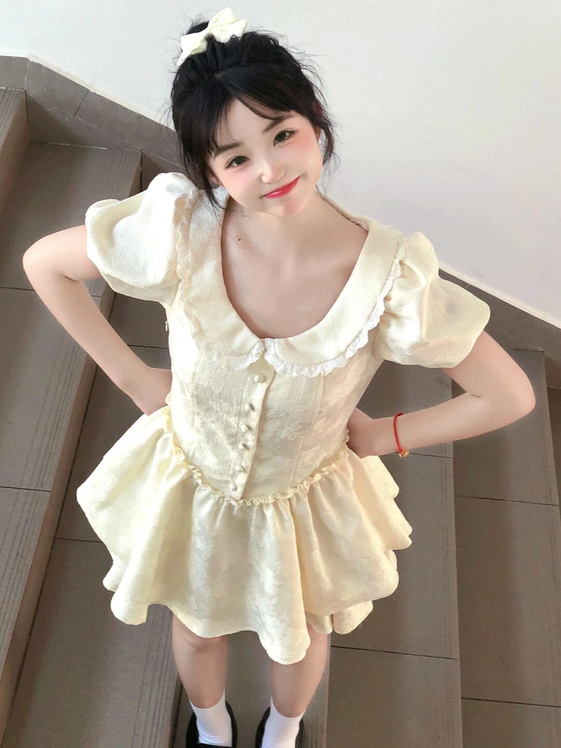 减龄少女感连衣裙夏季2025新款娃娃领收腰显瘦单排扣设计感短裙子