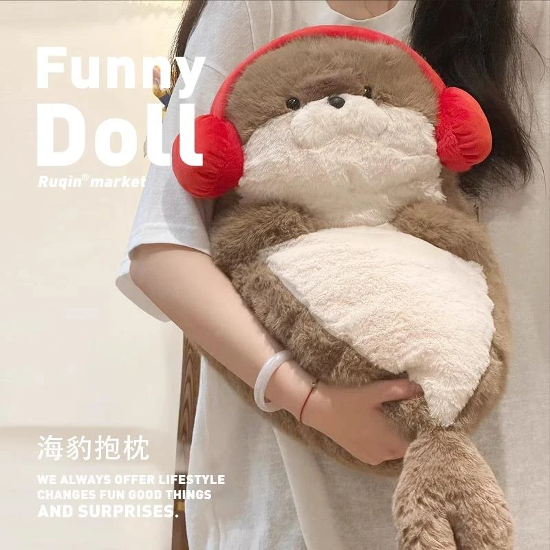 可爱耳机海豹玩偶睡觉抱公仔毛绒玩具海獭抱枕娃娃生日礼物女生软
