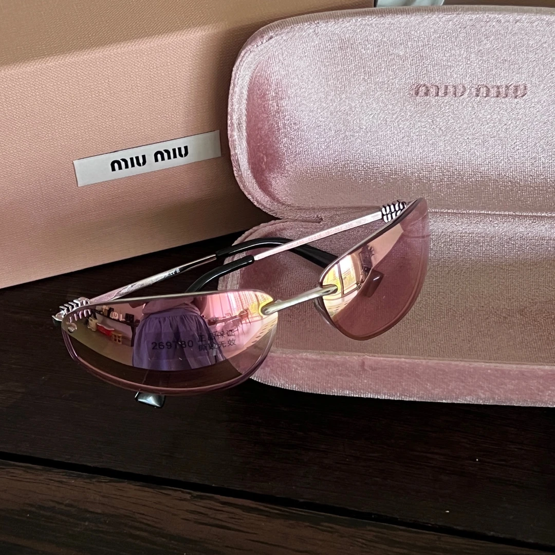 95新 MIU MIU/缪缪 千禧一代- 粉镭射猫眼墨镜-14393818