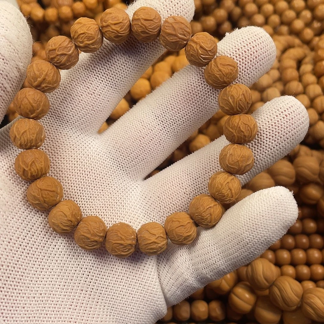 豆***菜核桃毒液手串。