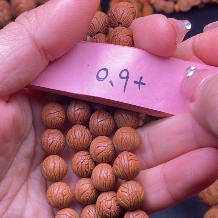 宜***成秦岭龙纹桃核108颗