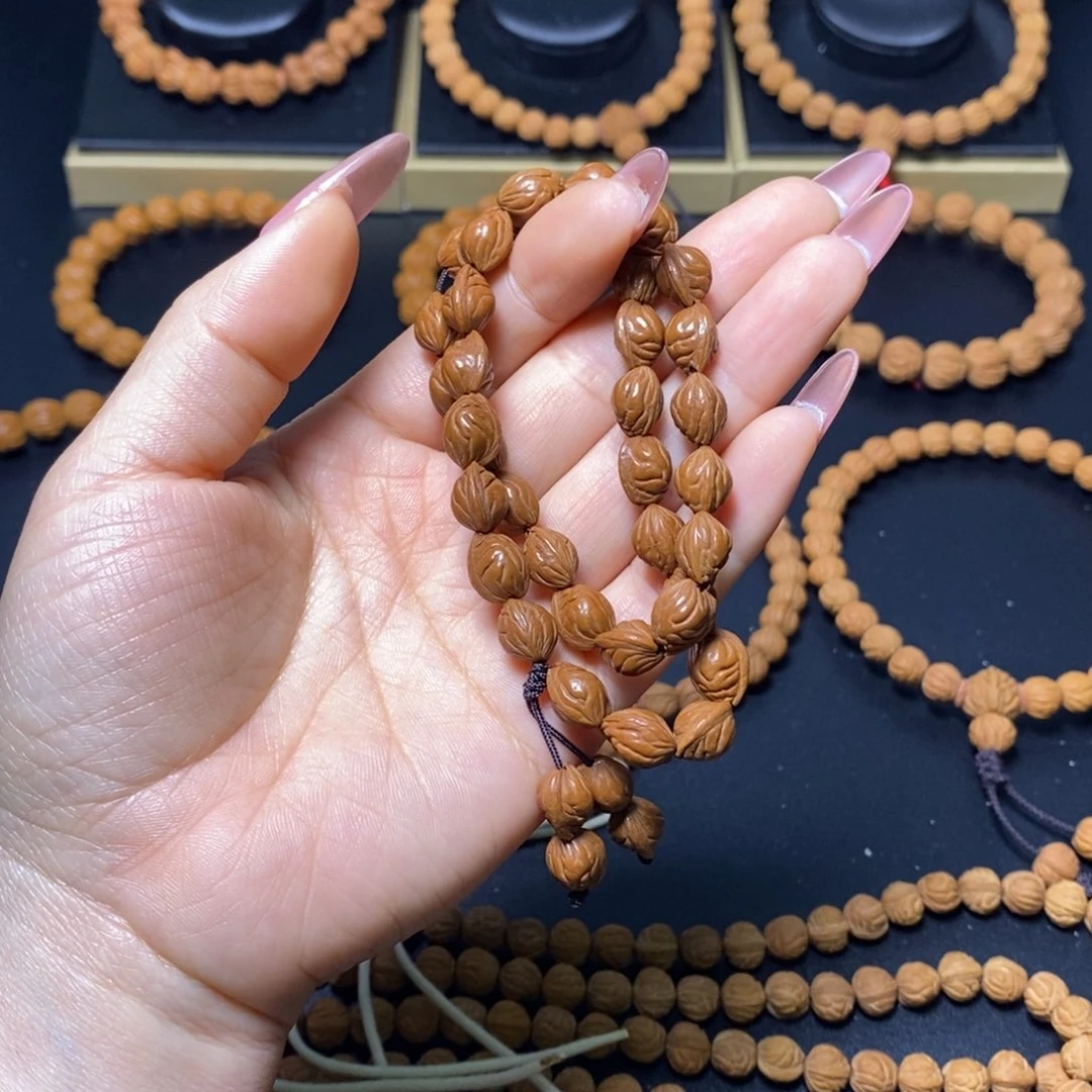 披****桃核吊坠秦岭文玩