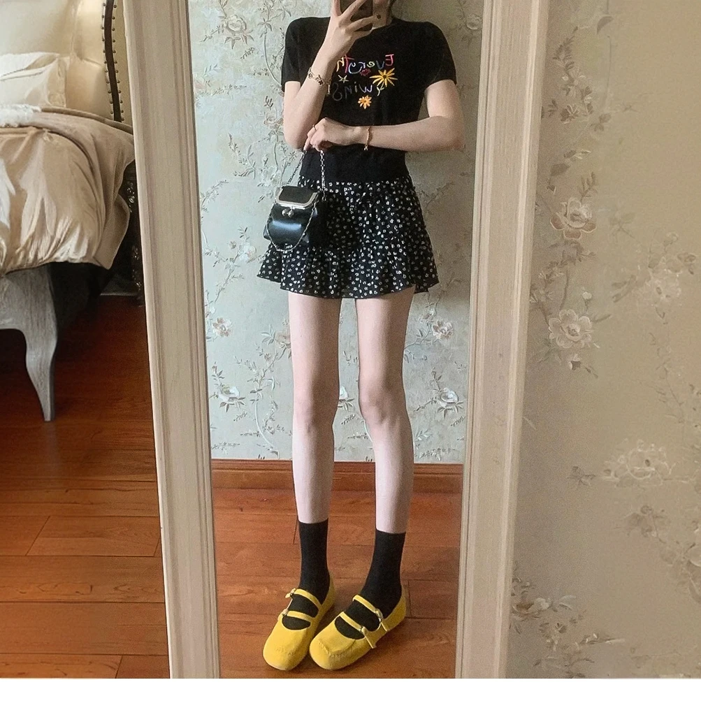 黑色碎花蛋糕短裙女夏季新款大码胖mm遮肚显瘦梨形身材a字半身裙