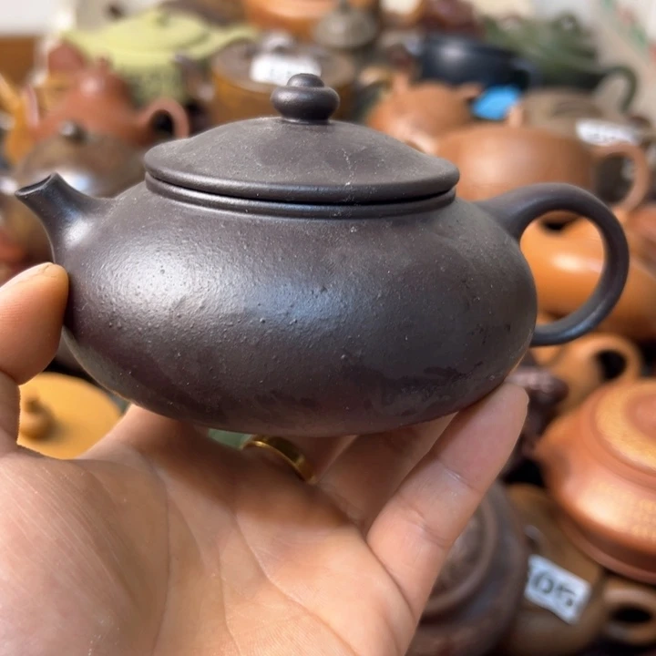 紫砂茶壶壶身起痘盖子打不开