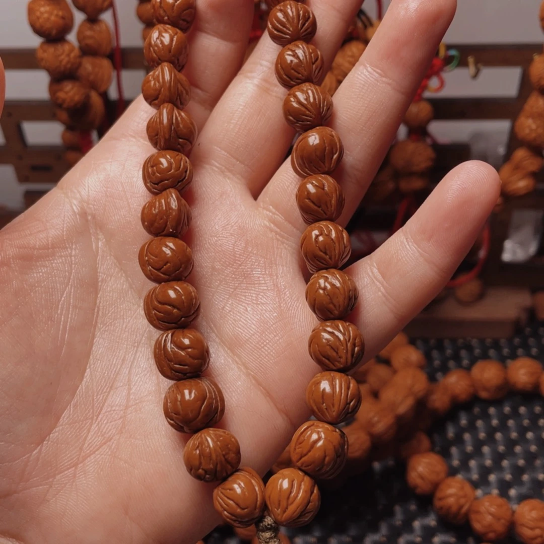 木质类龙纹桃枭手持