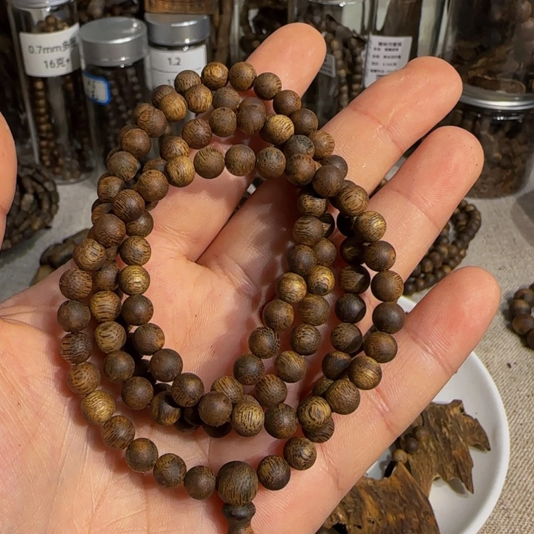 聊***叭手串沉香海南白棋0.6标本