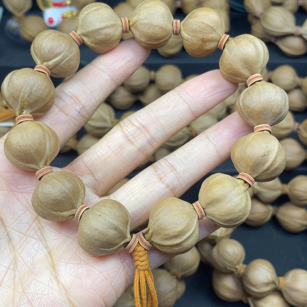 石***司005橄榄核三花20*20