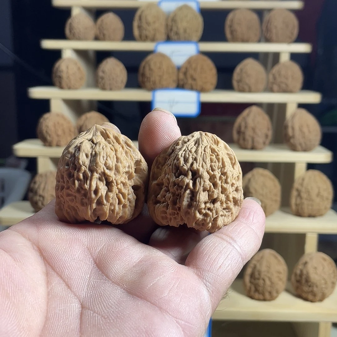 姚***州桃核吊坠文玩核桃南将石