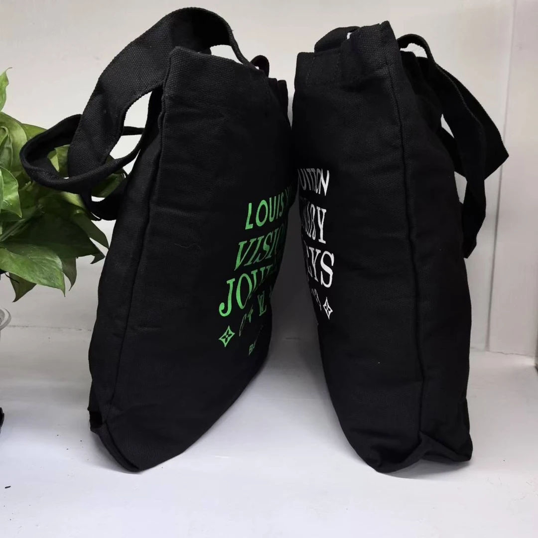 小驴肉火烧黑色帆布托特妆包包