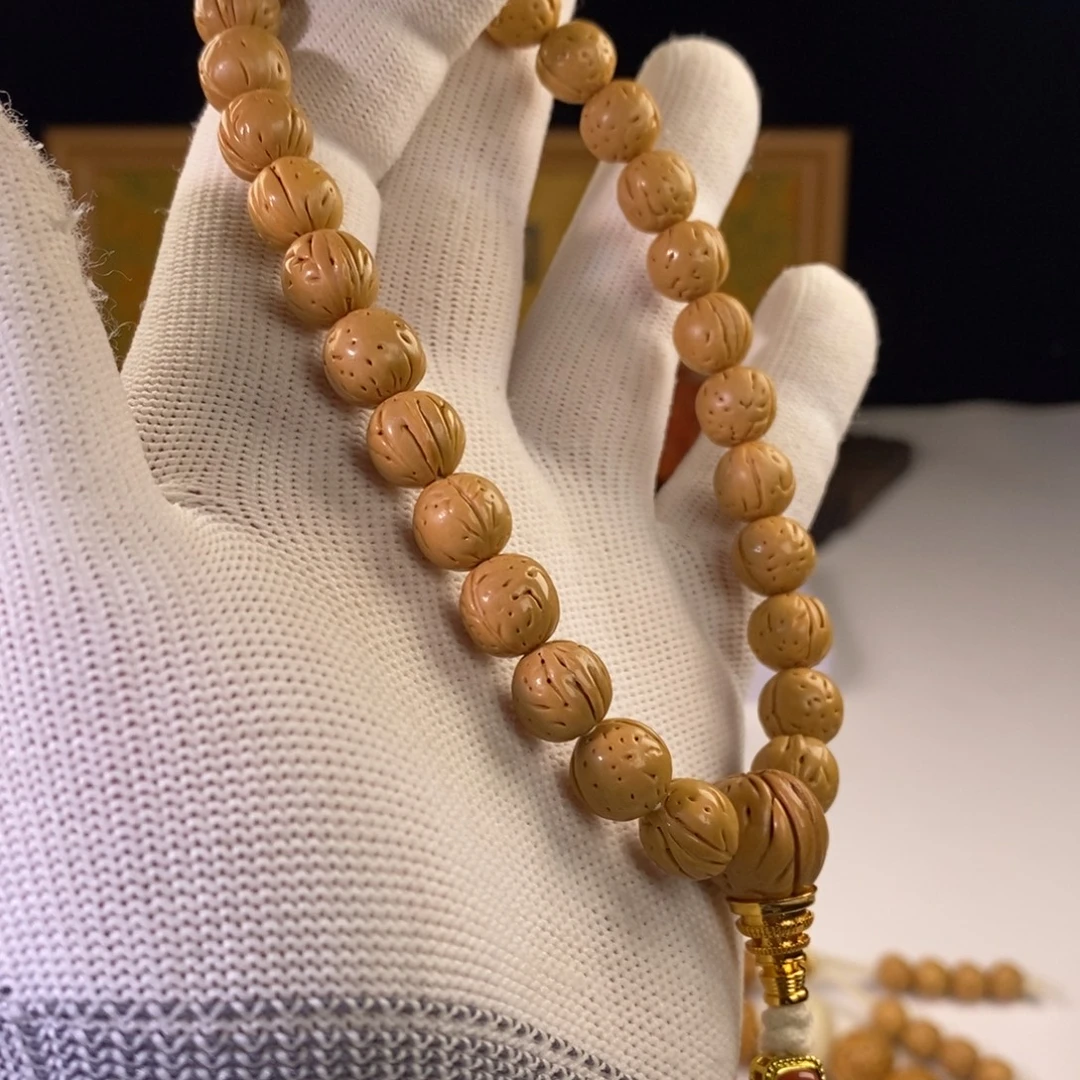 桃核吊坠野生桃核尺寸9奶油皮手持