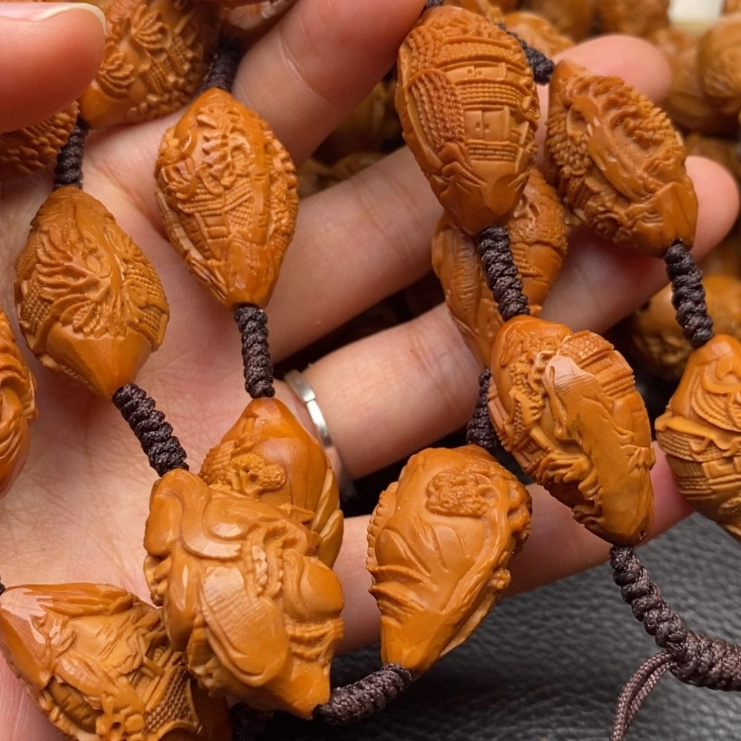 兄***鲜手串橄榄核苏州园林脖挂