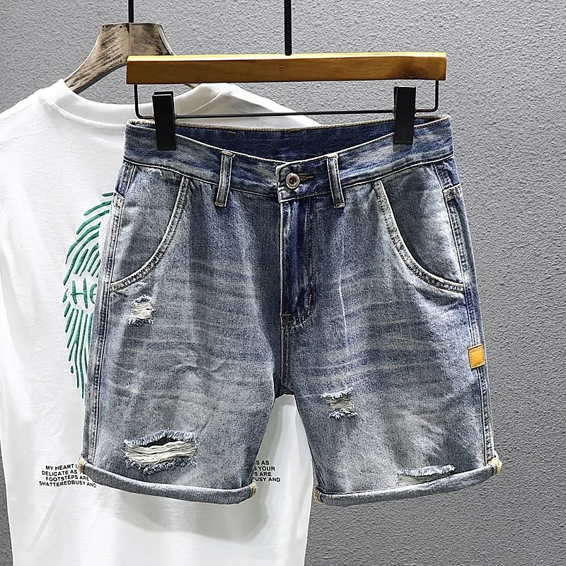 夏季薄款破洞牛仔短裤男士潮牌宽松五分裤休闲大码浅色马裤短裤男