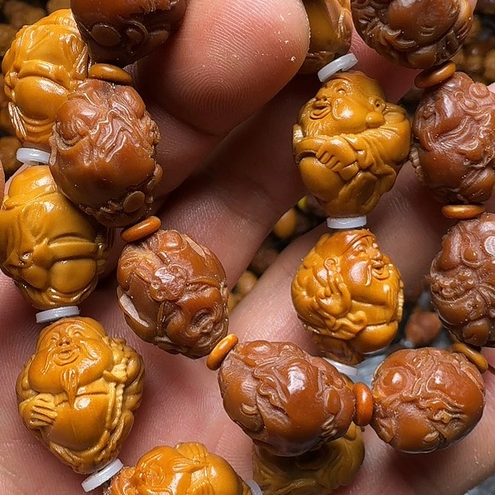 橄榄核把件你是谁