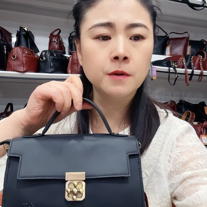 织物头层牛皮10996黑色包包