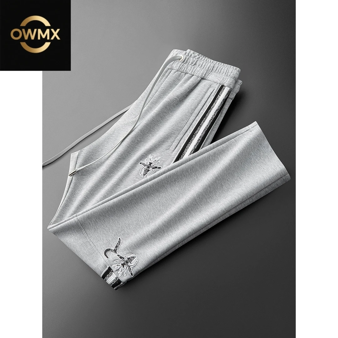 秋季时尚潮流撞色蜜蜂刺绣拼接休闲裤男士潮牌轻奢小直筒卫裤男款