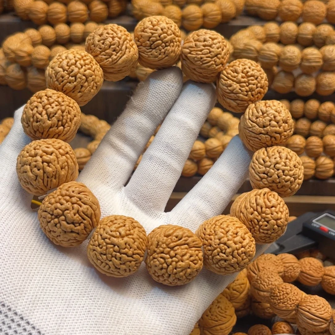 手串桃核裁*龙鳞凤尾