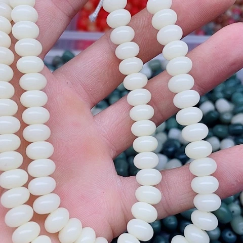 白玉菩提吊坠9奶黄算盘114颗