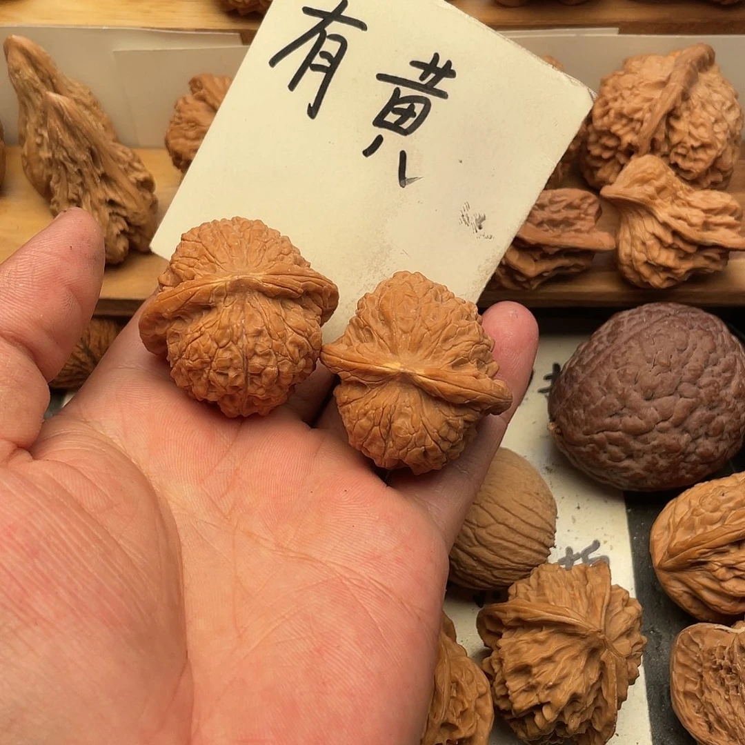 想***樱文玩核桃吊坠麒麟