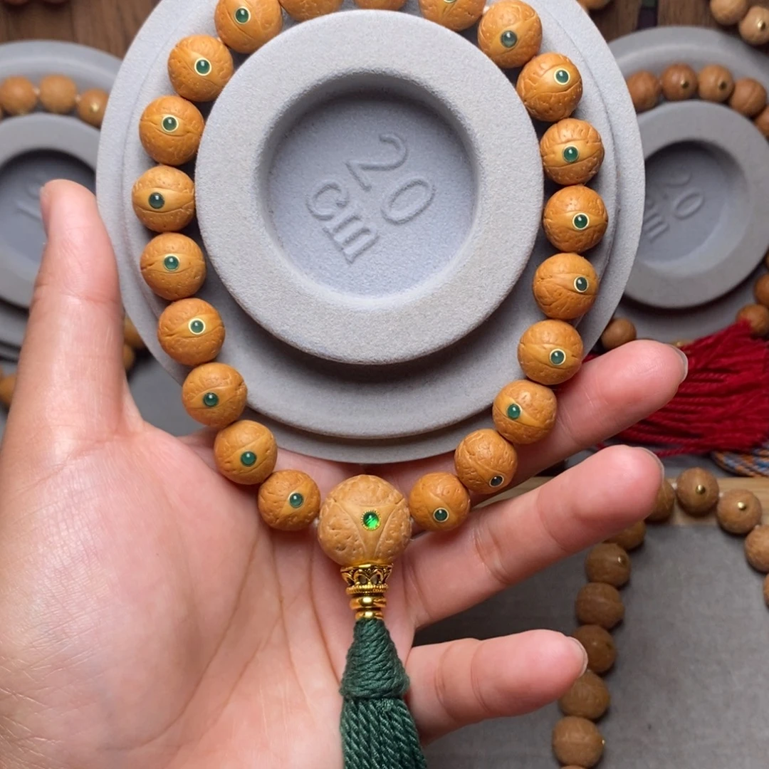 এ***博凤眼菩提手串12mm➕绿宝石
