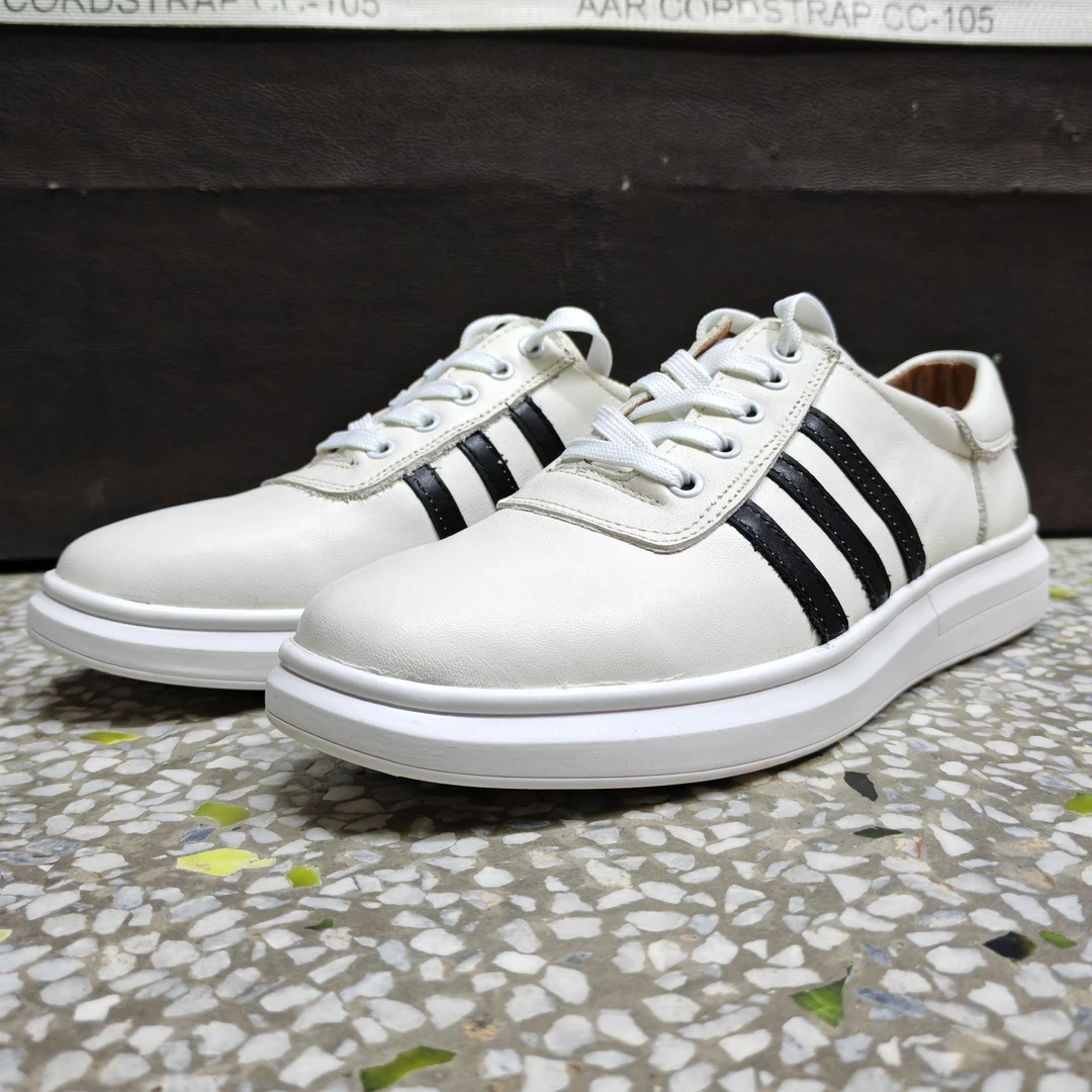 头层牛皮新款时尚男士休闲鞋透气男款系带板鞋