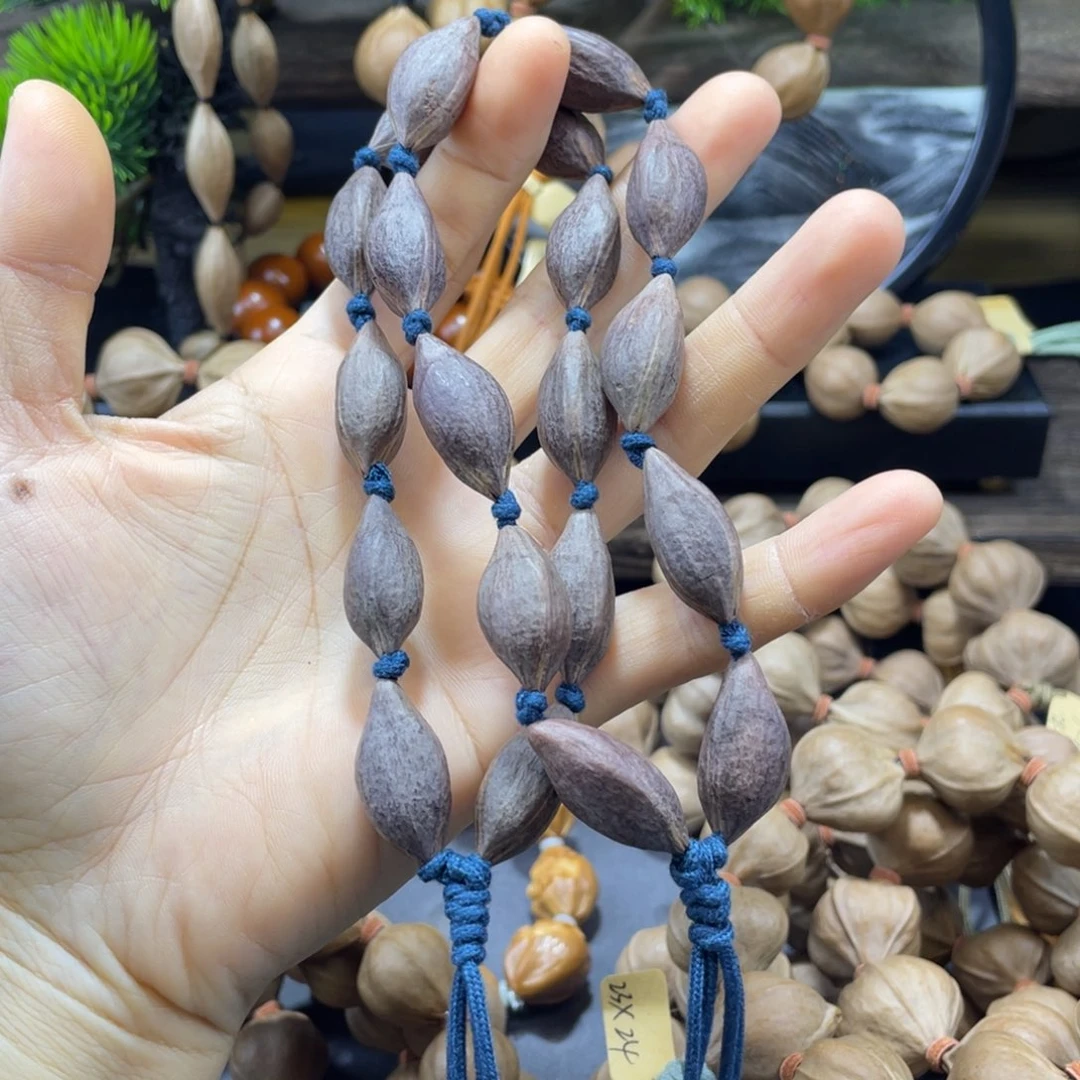 三***五吊坠橄榄核紫皮全紫，