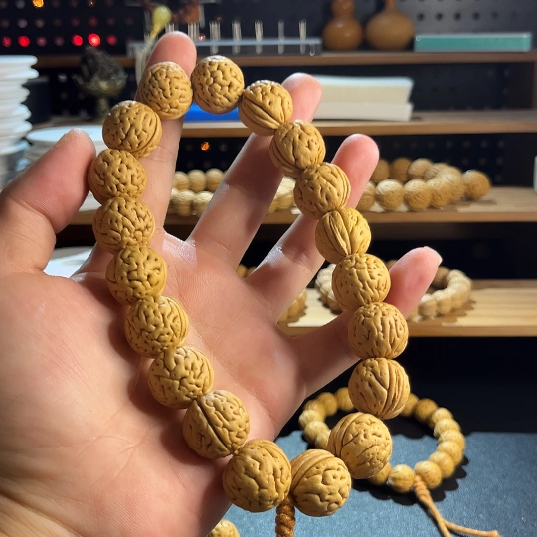 桃核吊坠18盘锦肌肉大手持