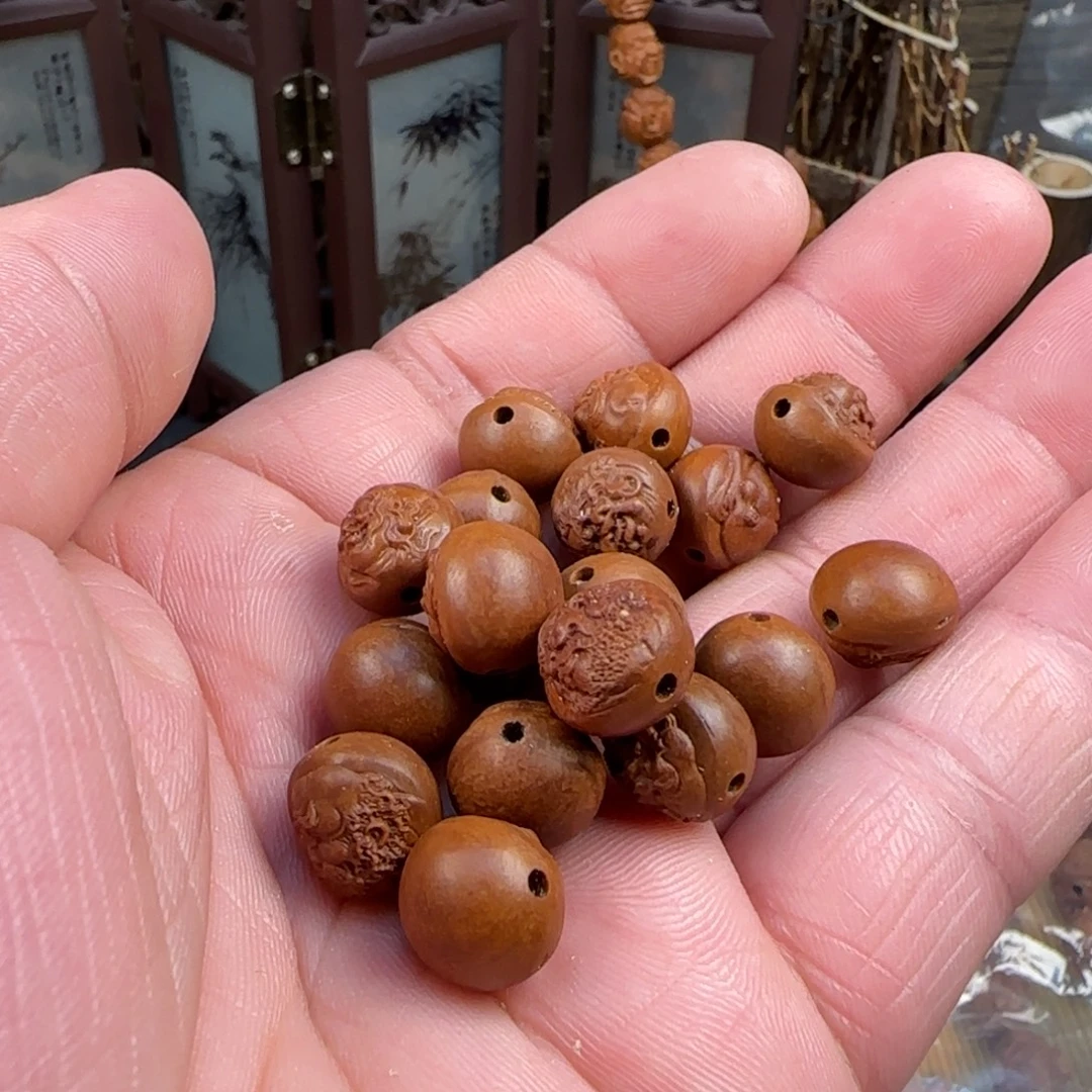 M***.精工手修龙纹桃核浮雕十八罗汉