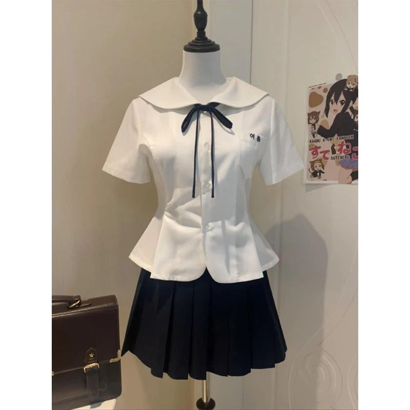 夏季穿搭一整套2025新款学院风娃娃领短袖衬衫百搭百褶短裙两件套