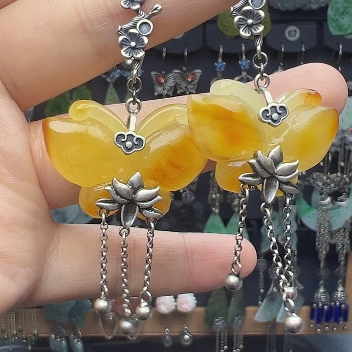 苏***苏琥珀银S925镶嵌耳饰