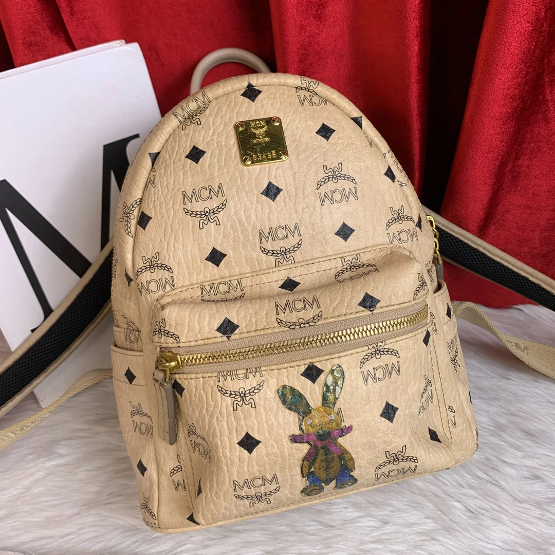 95新 MCM 米色双肩包/EE09617118/7118/瑕