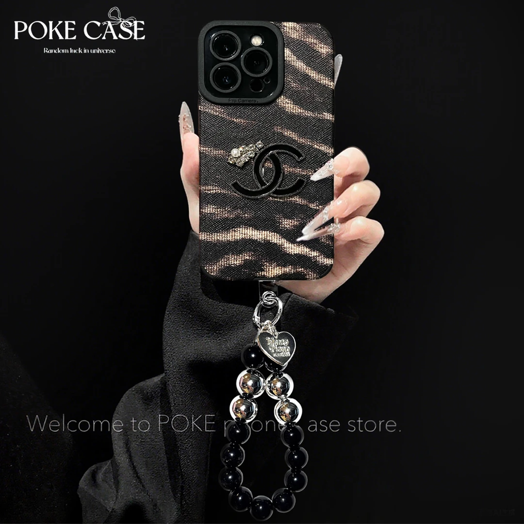 轻奢瞳眼十字纹豹纹适用于苹果16华为vivo小米oppo手链手机壳