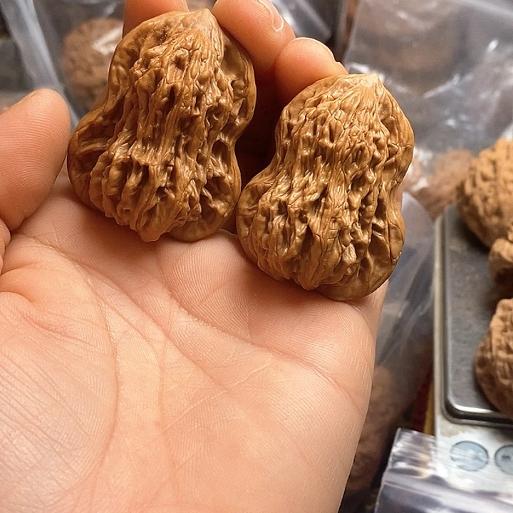 桃核把件互****?麦穗葫芦