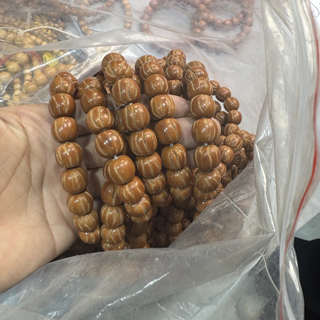 z3龙纹桃核手串13+左右