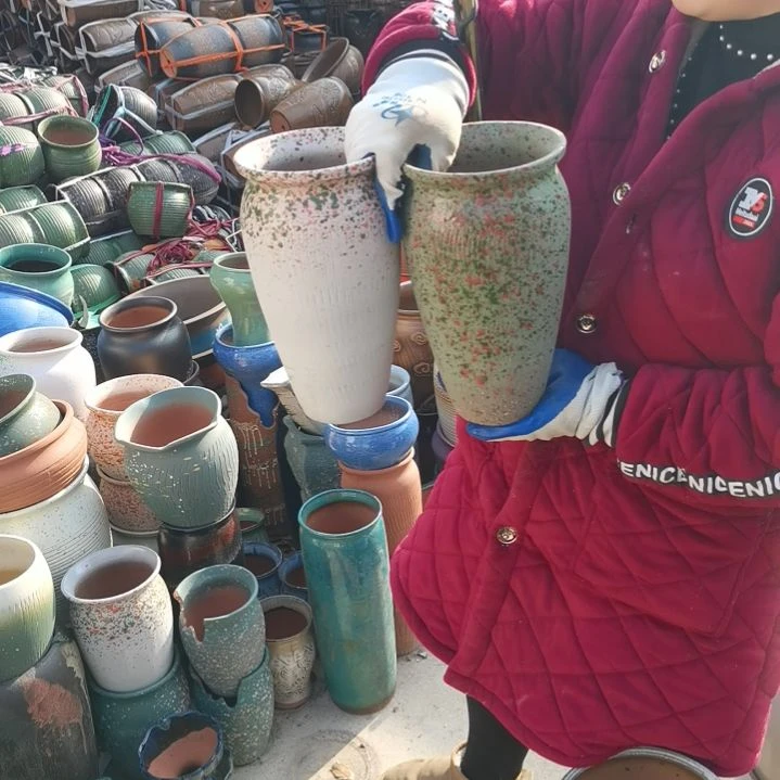 红陶口14高25瑕疵两盆口变形扁了